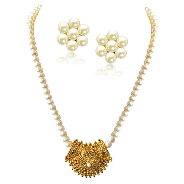gold pearl necklace and earrings